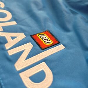 Lego Logo Embroidered on a Blue Fabric